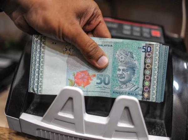 Ringgit opens marginally better against US dollar